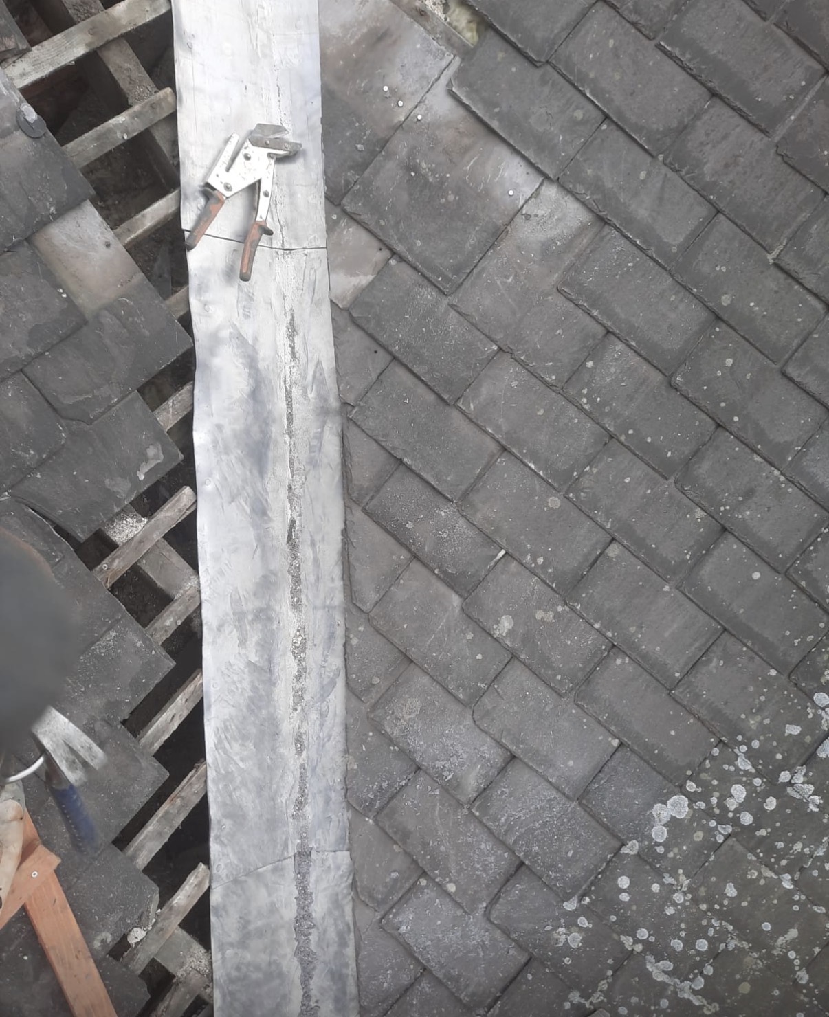 Roof repair finished with neat valleys